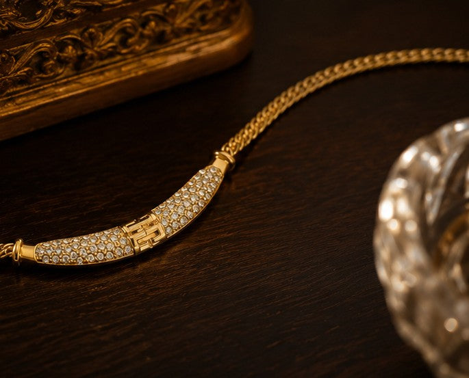 Gold-plated necklace crystal centerpiece close-up