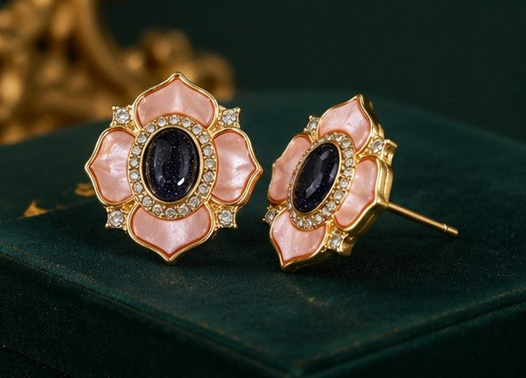 Pink mother-of-pearl camellia stud earrings side view