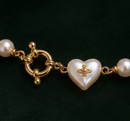 Pearl heart necklace centerpiece and clasp detail
