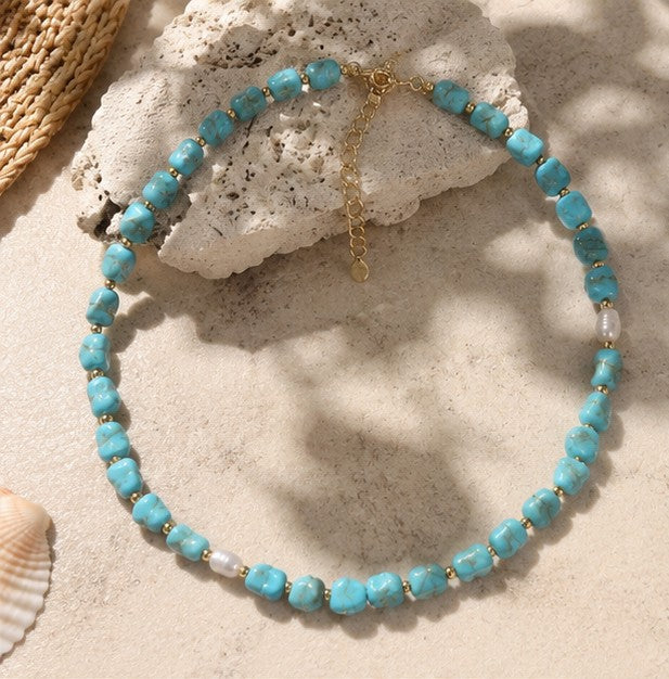 Turquoise-color beaded necklace with pearl accents